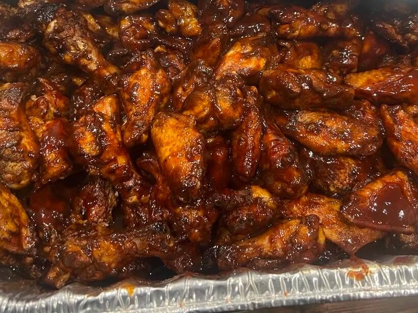 BBQ party wings prepared by Coleman BBQ