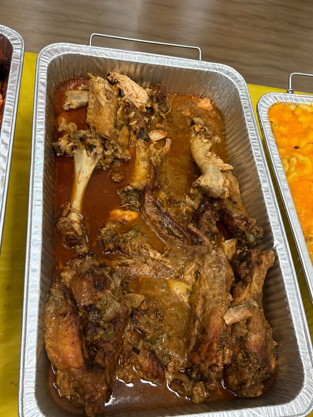 Seasoned turkey wings in a catering tray